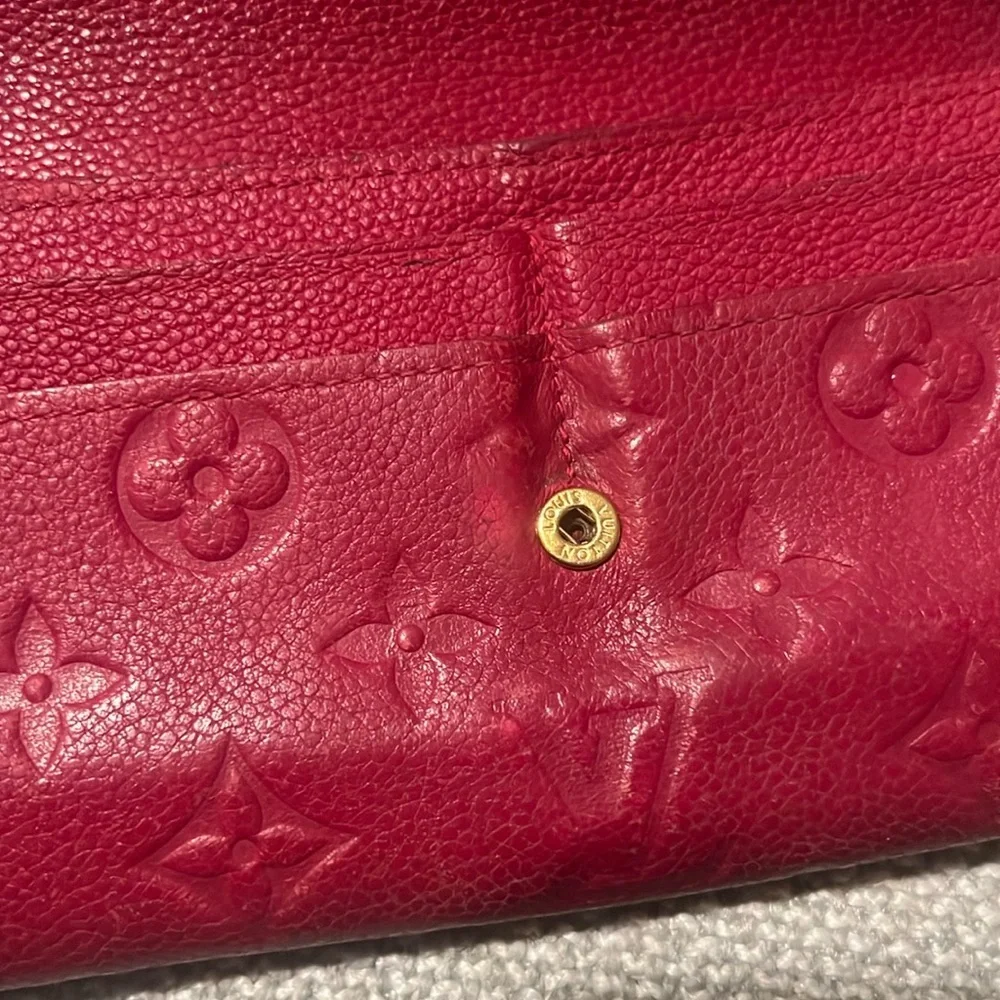 Authentic Louis Vuitton Empriente Sarah wallet raspberry color CA1183